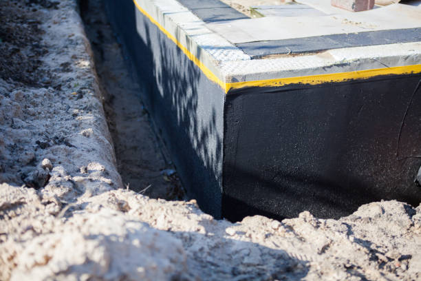 Professional Waterproofing technician working in Rochester, MN